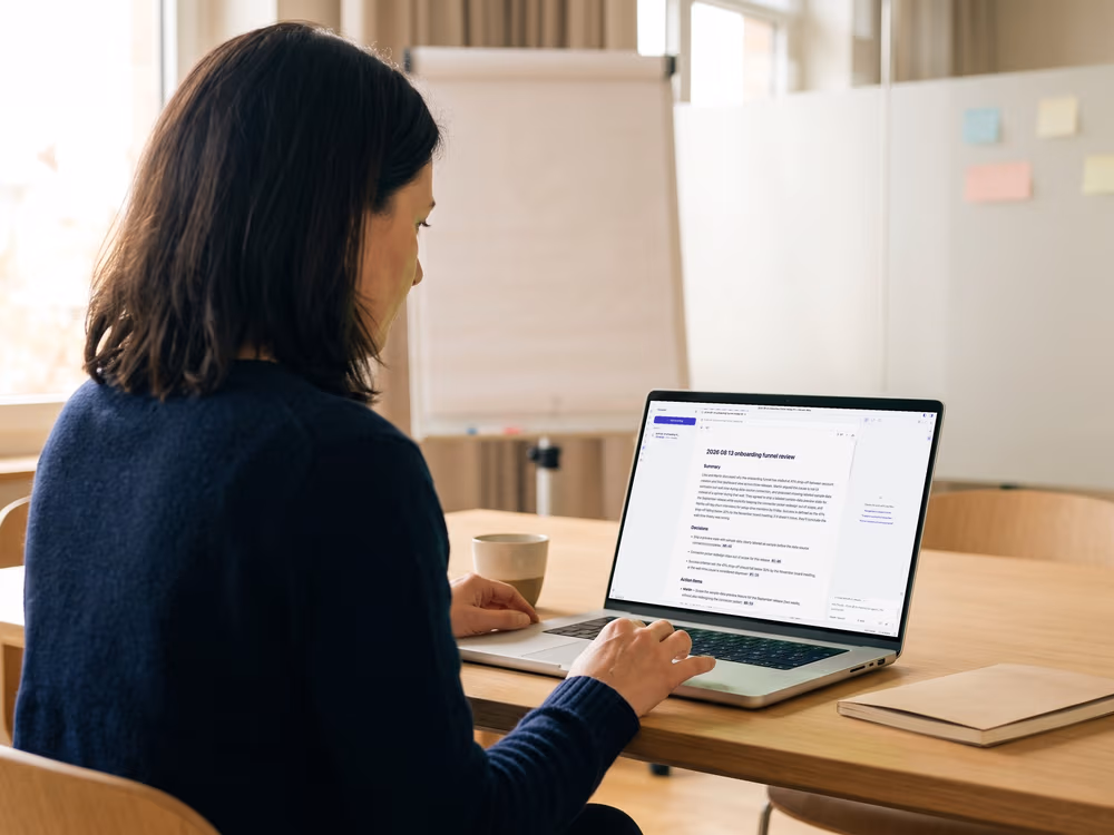 A consultant working in Ritemark (illustration; the screen is a real Ritemark screenshot)