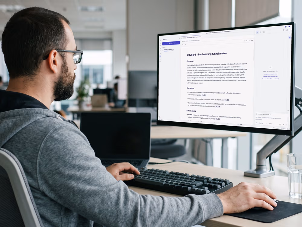 A technical writer working in Ritemark (illustration; the screen is a real Ritemark screenshot)